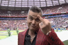 Robbie Williams In Strife After Flipping The Bird During World Cup Opener