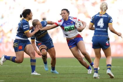 Millie Elliott (R) fending off Tayla Preston (L).